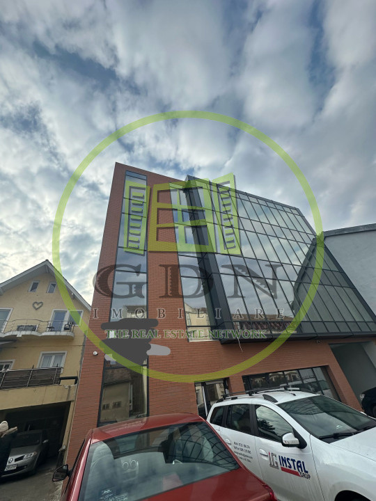 Cladire spatiu comercial si birouri,  209.8 mp utili, parcare in subteran