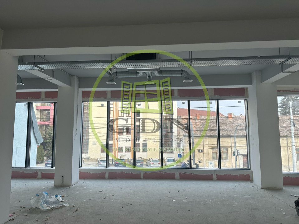 Cladire spatiu comercial si birouri,  209.8 mp utili, parcare in subteran