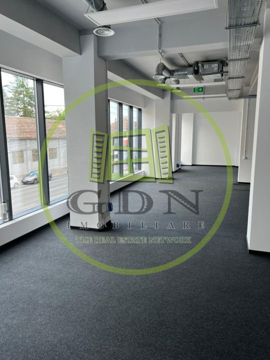 Cladire spatiu comercial si birouri,  209.8 mp utili, parcare in subteran