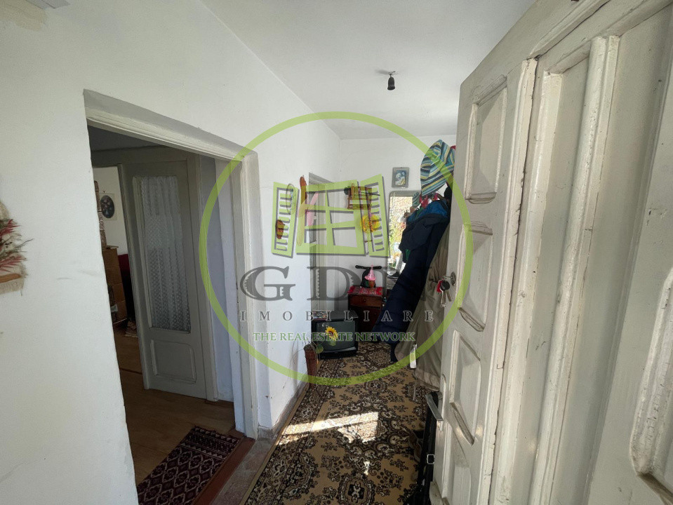 Casă parter bilaterală cu teren de 401mp și toate utilitățile în Catargiu 