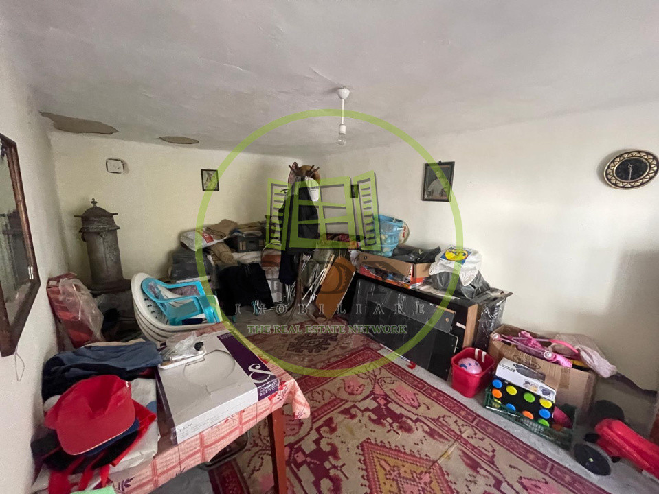 Casă parter bilaterală cu teren de 401mp și toate utilitățile în Catargiu 