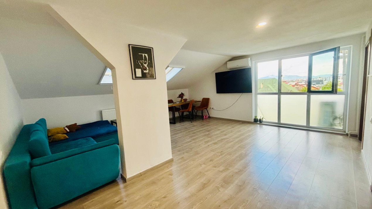 Apartament la mansarda