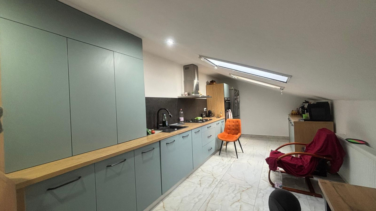 Apartament la mansarda
