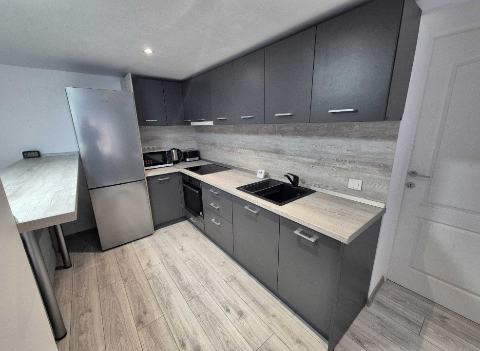 Apartament modern de închiriat – 2 camere, 57 mp utili, zona Orașul de Jos
