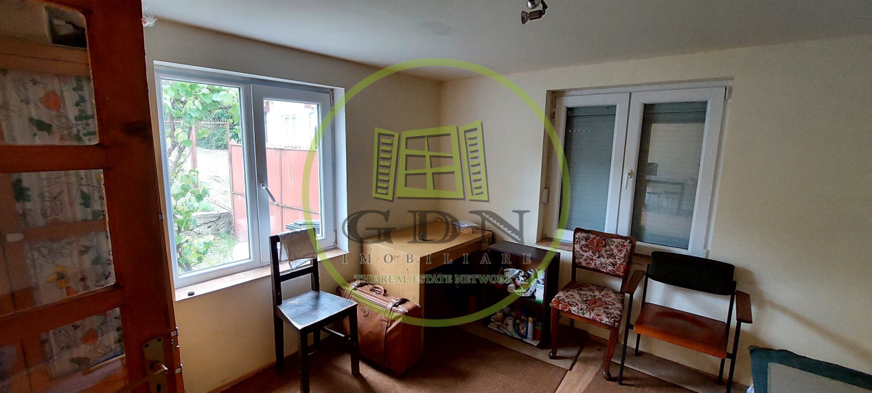Casa 2 camere cu suprafata 50mp si teren 1300mp,în Miercurea Sibiului 