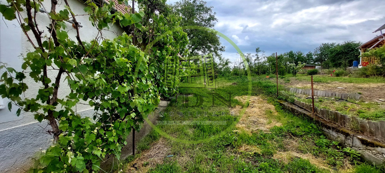 Casa 2 camere cu suprafata 50mp si teren 1300mp,în Miercurea Sibiului 