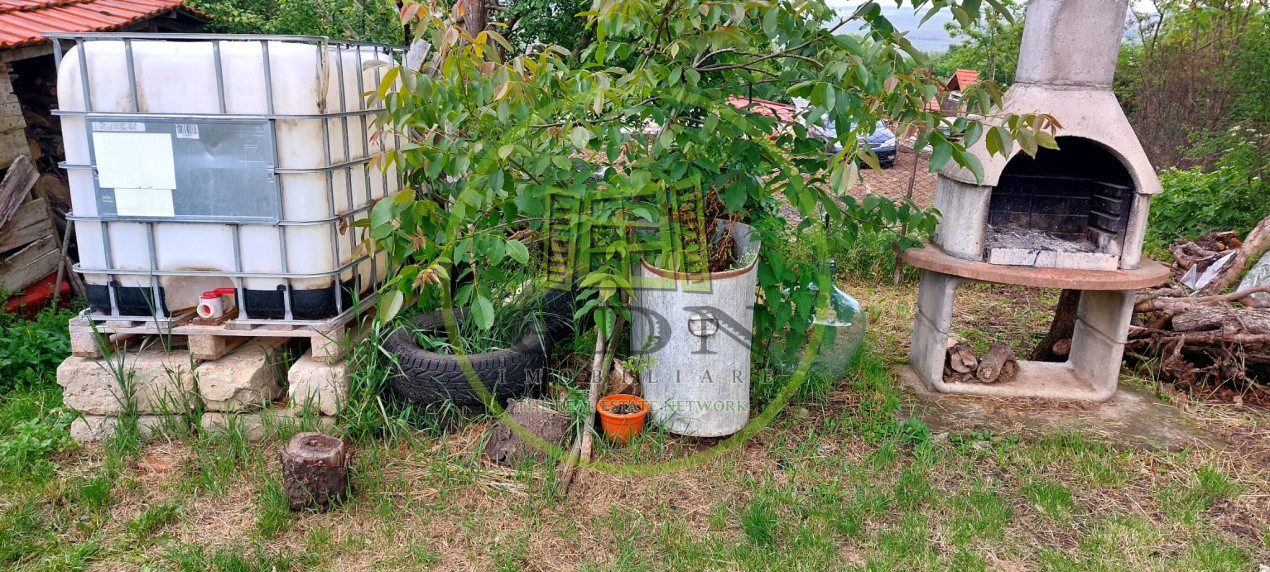Casa 2 camere cu suprafata 50mp si teren 1300mp,în Miercurea Sibiului 