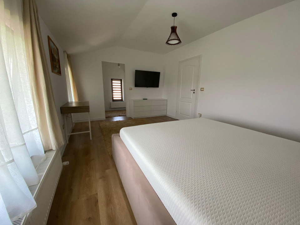 Casa individuala cu garaj 4 camere 