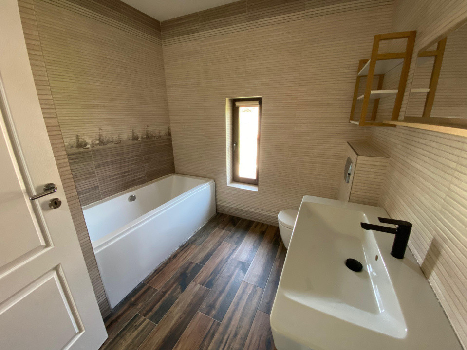 Casa individuala cu garaj 4 camere 