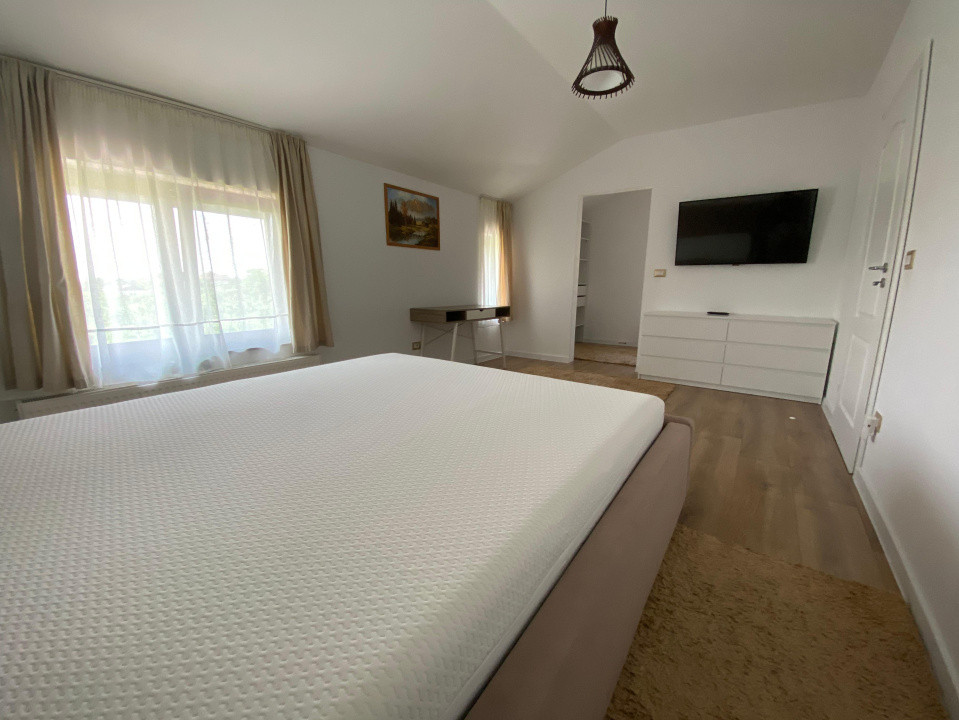 Casa individuala cu garaj 4 camere 