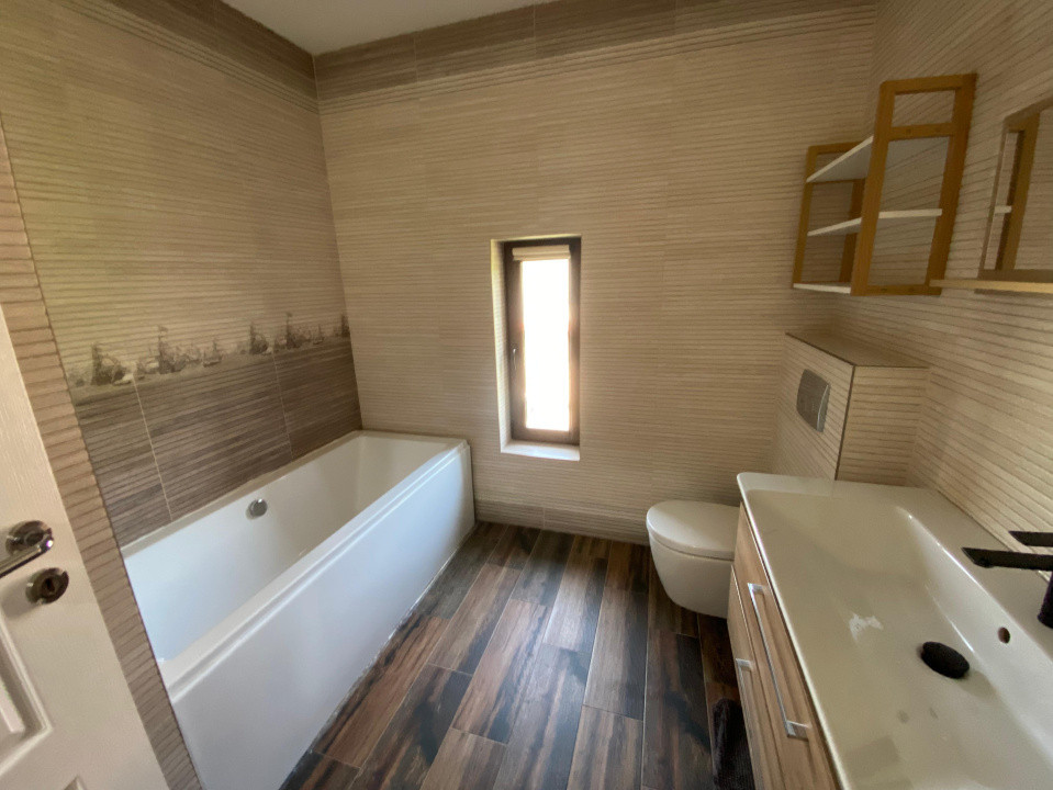 Casa individuala cu garaj 4 camere 