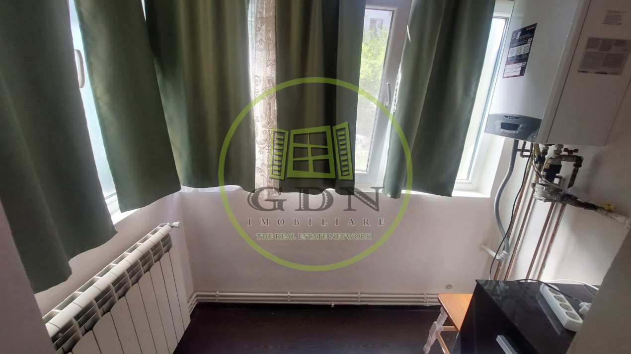 Apartament doua camere decomandat, parter, 1 Mai zona Pelendava