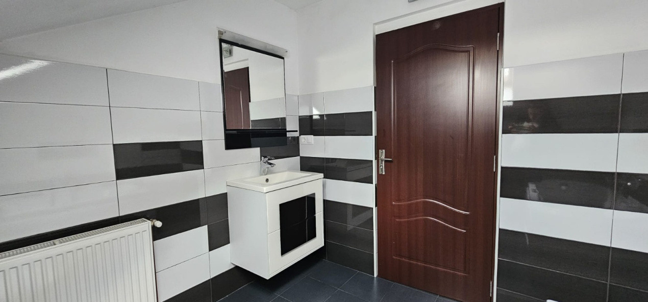 Casa cu 3 dormitoare si garaj 