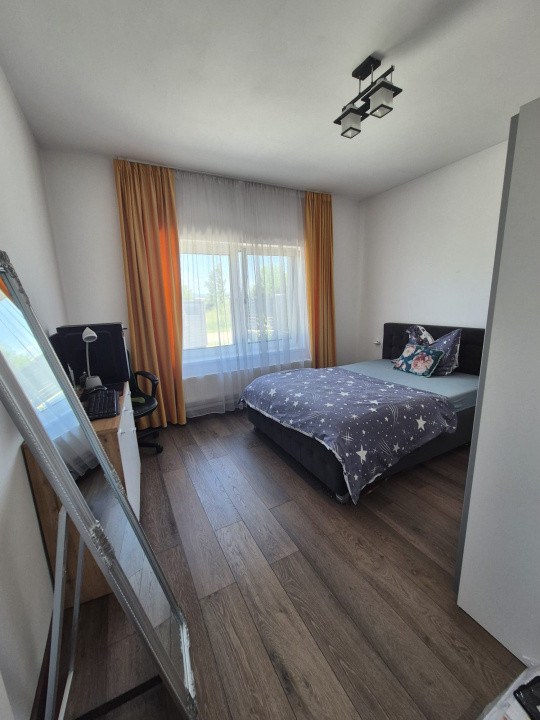 Casa pe nivel cu garaj si 6 ari teren