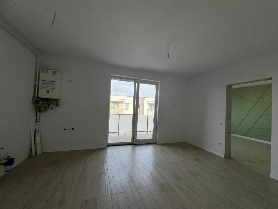 Apartament cu 2 camere si loc de parcare
