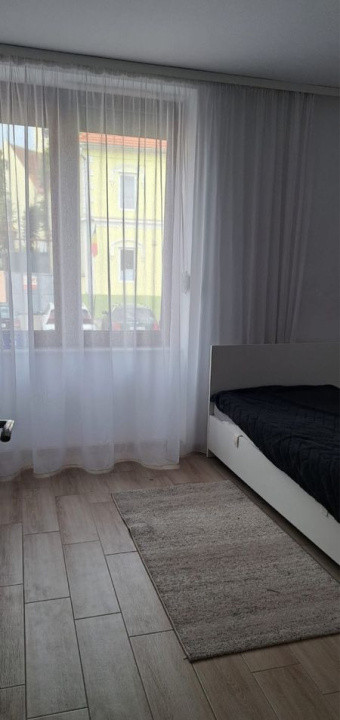 Apartament 3 camere la parterul unei vile, cu curte comună – 65 mp utili