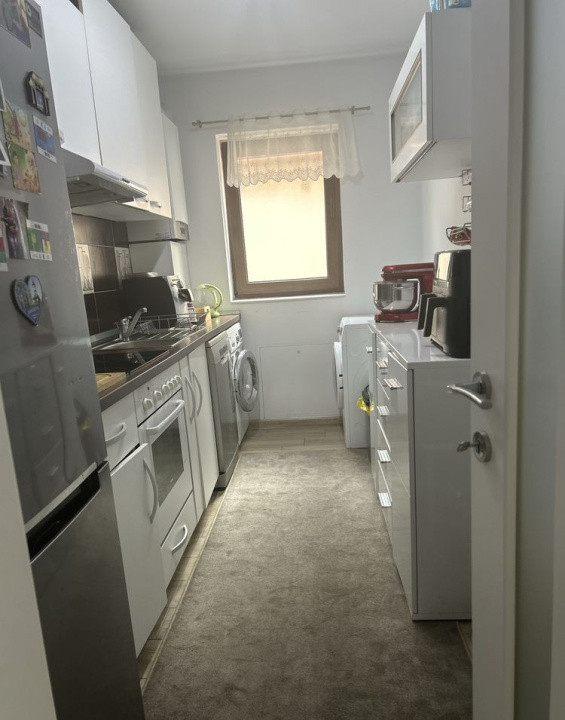 Apartament 3 camere la parterul unei vile, cu curte comună – 65 mp utili