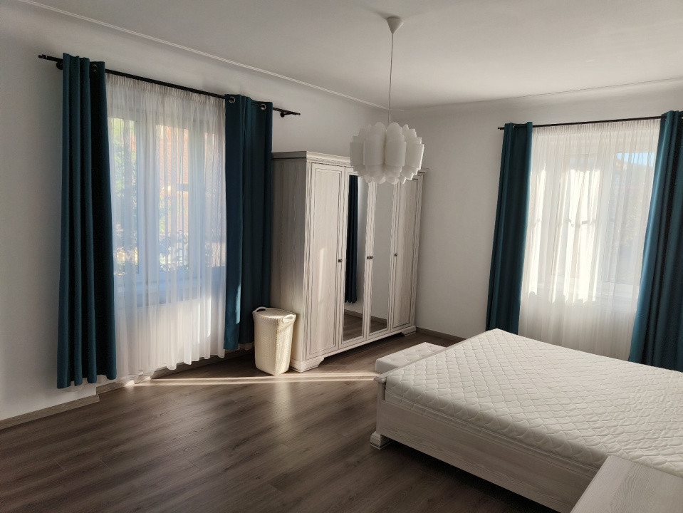 Apartament 4 camere la casă-115 mp- curte mare