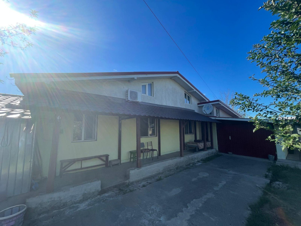Casă parter cu garaj construită în 2011, cu teren de 511mp în Mogoșești Dolj