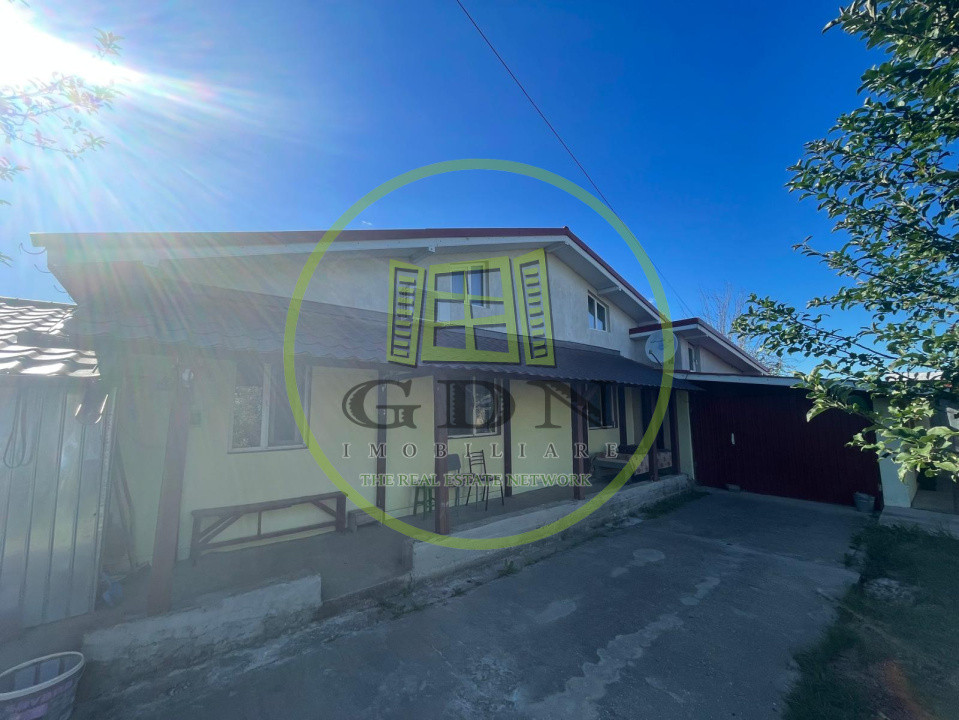 Casă parter cu garaj construită în 2011, cu teren de 511mp în Mogoșești Dolj