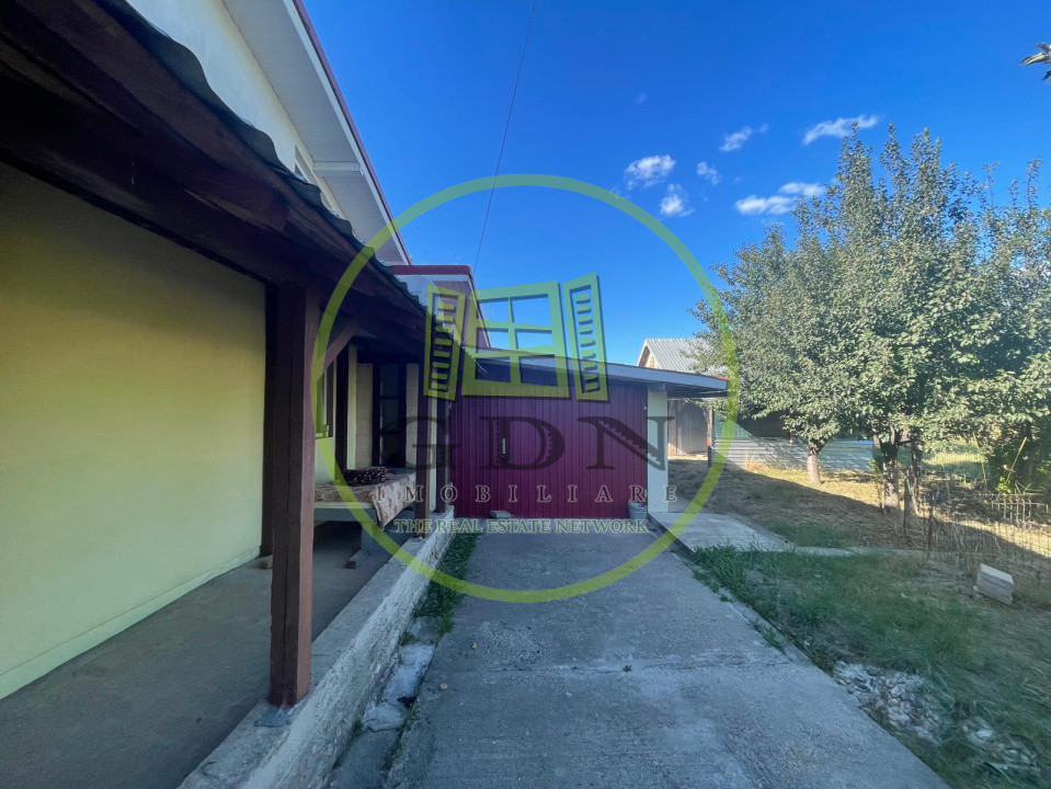 Casă parter cu garaj construită în 2011, cu teren de 511mp în Mogoșești Dolj