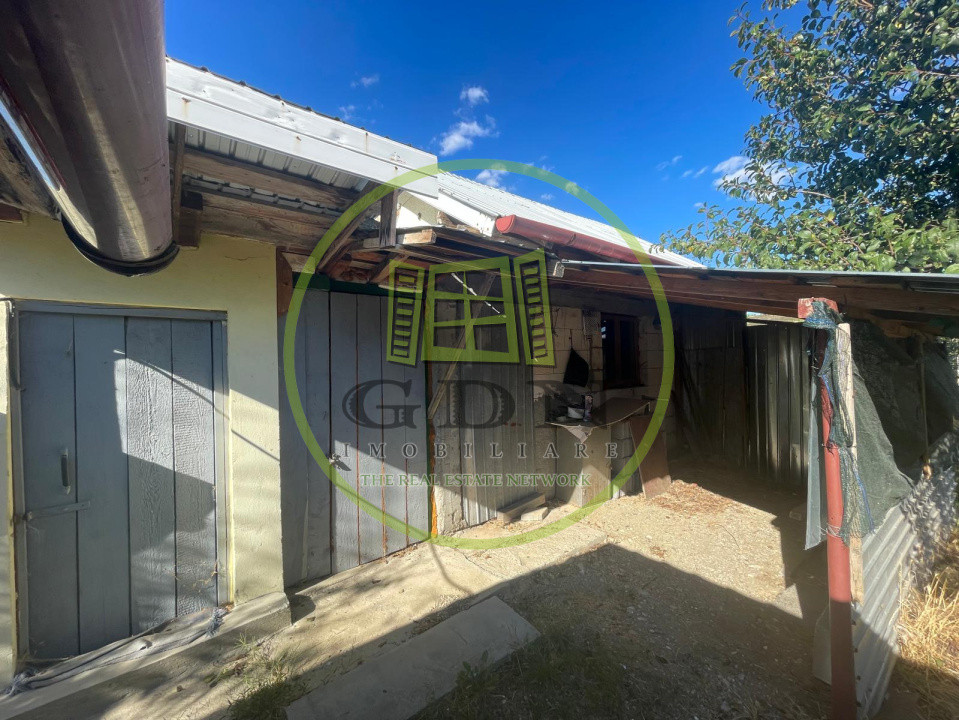 Casă parter cu garaj construită în 2011, cu teren de 511mp în Mogoșești Dolj