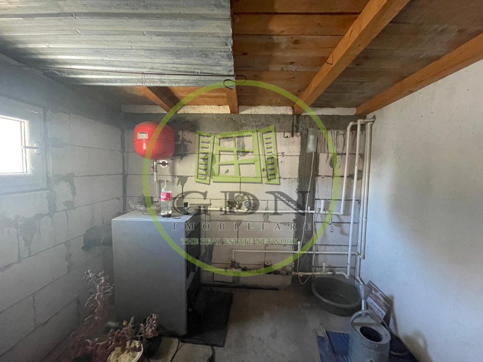 Casă parter cu garaj construită în 2011, cu teren de 511mp în Mogoșești Dolj