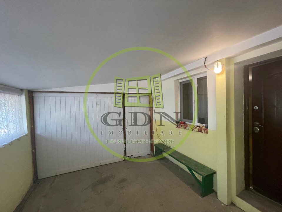 Casă parter cu garaj construită în 2011, cu teren de 511mp în Mogoșești Dolj