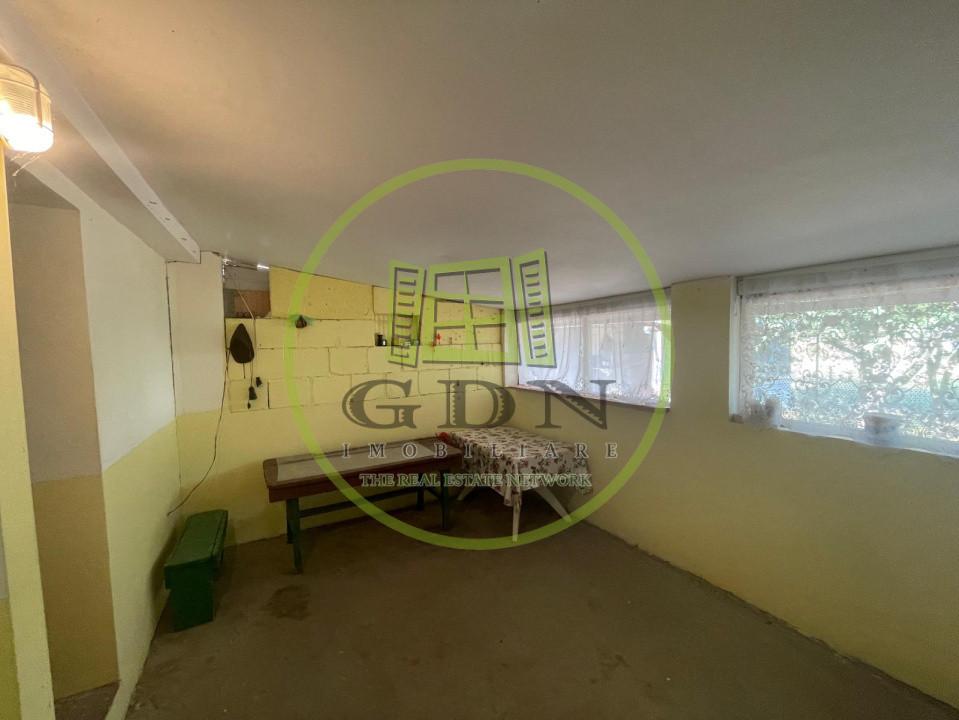 Casă parter cu garaj construită în 2011, cu teren de 511mp în Mogoșești Dolj