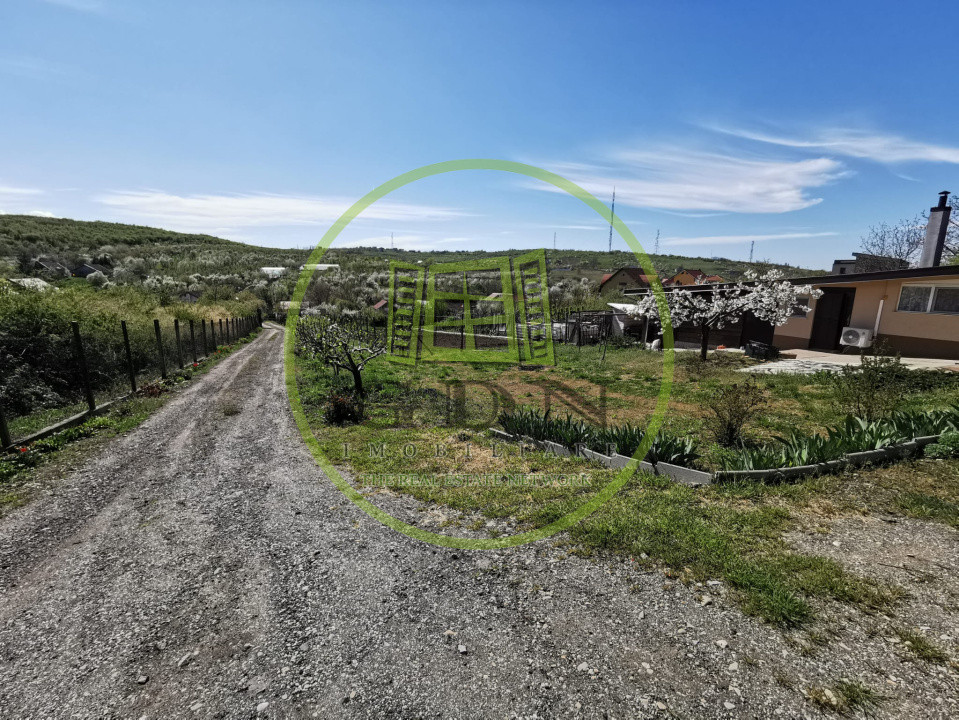 Teren intravilan si extravilan cu anexa gospodareasca amenajata, cu utilitati