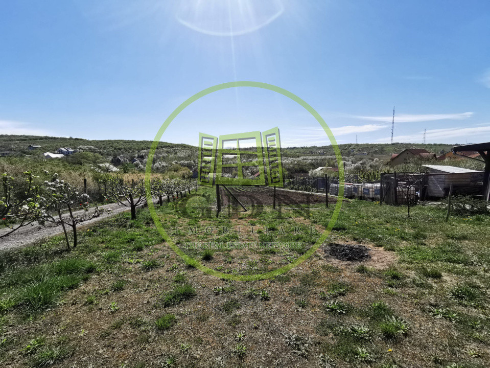 Teren intravilan si extravilan cu anexa gospodareasca amenajata, cu utilitati