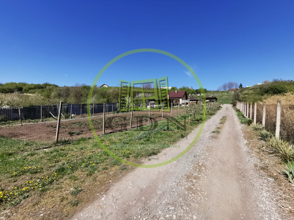 Teren intravilan si extravilan cu anexa gospodareasca amenajata, cu utilitati