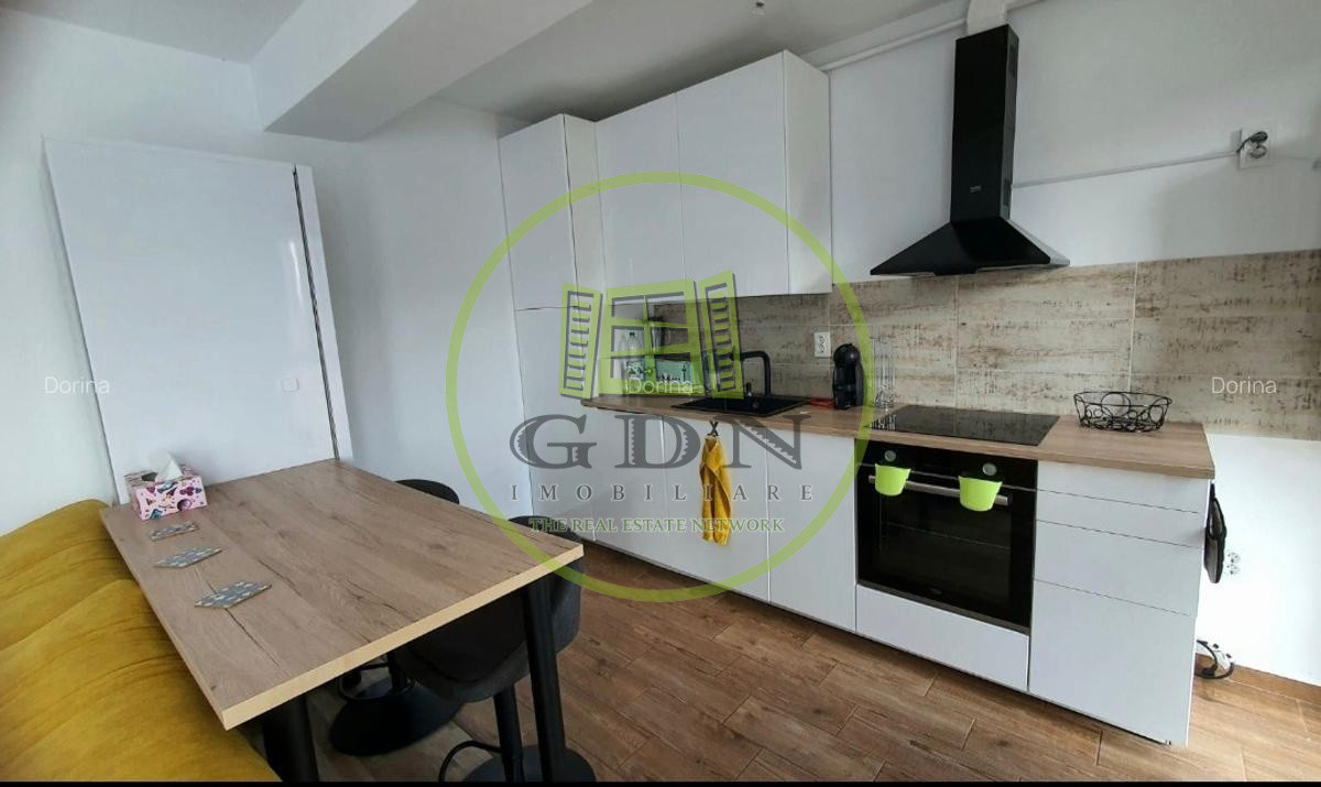 APARTAMENT 2 CAMERE CU GRADINA SI LOC DE PARCARE- zonaTractorul ,Brasov