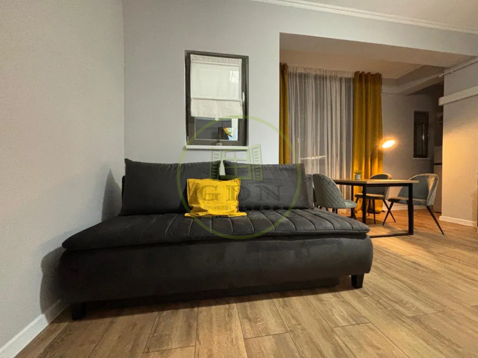 Apartament 2 camere mobilat & utilat • Etaj intermediar • Parcare inclusă
