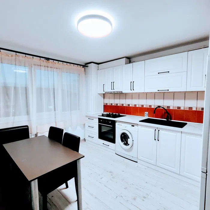 Apartament modern la mansardă 3 camere central 42 mp