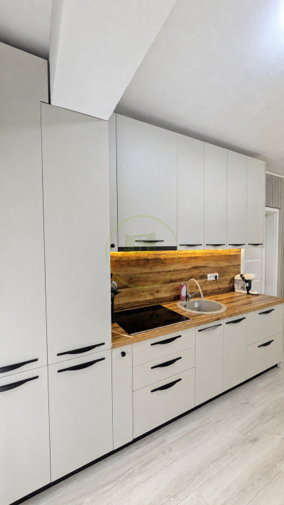 Apartament modern cu design impecabil, 3 camere, 2 băi și parcare