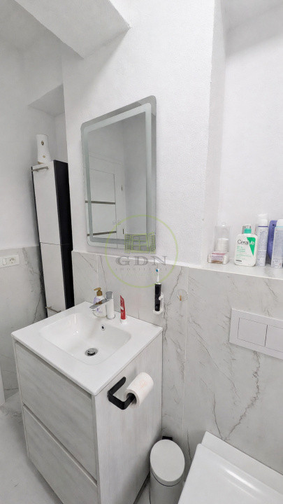 Apartament modern cu design impecabil, 3 camere, 2 băi și parcare