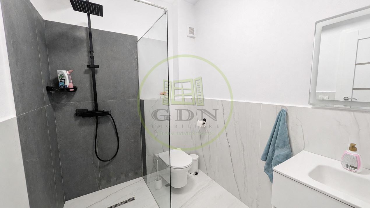 Apartament modern cu design impecabil, 3 camere, 2 băi și parcare