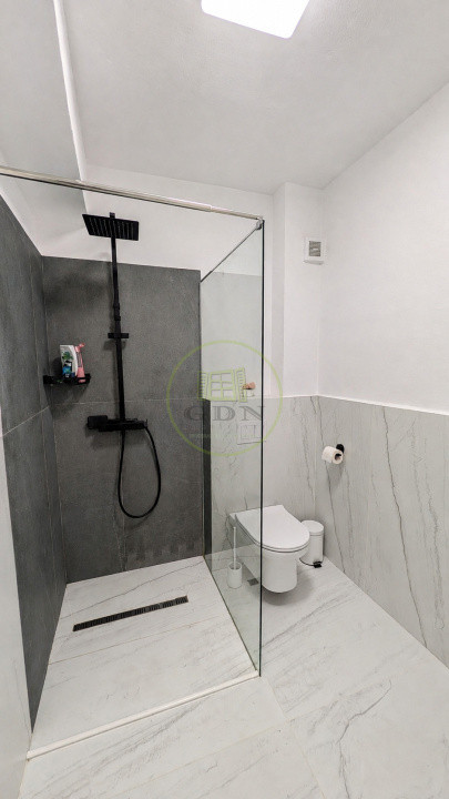 Apartament modern cu design impecabil, 3 camere, 2 băi și parcare