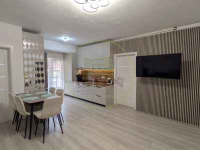 Apartament modern cu design impecabil, 3 camere, 2 băi și parcare