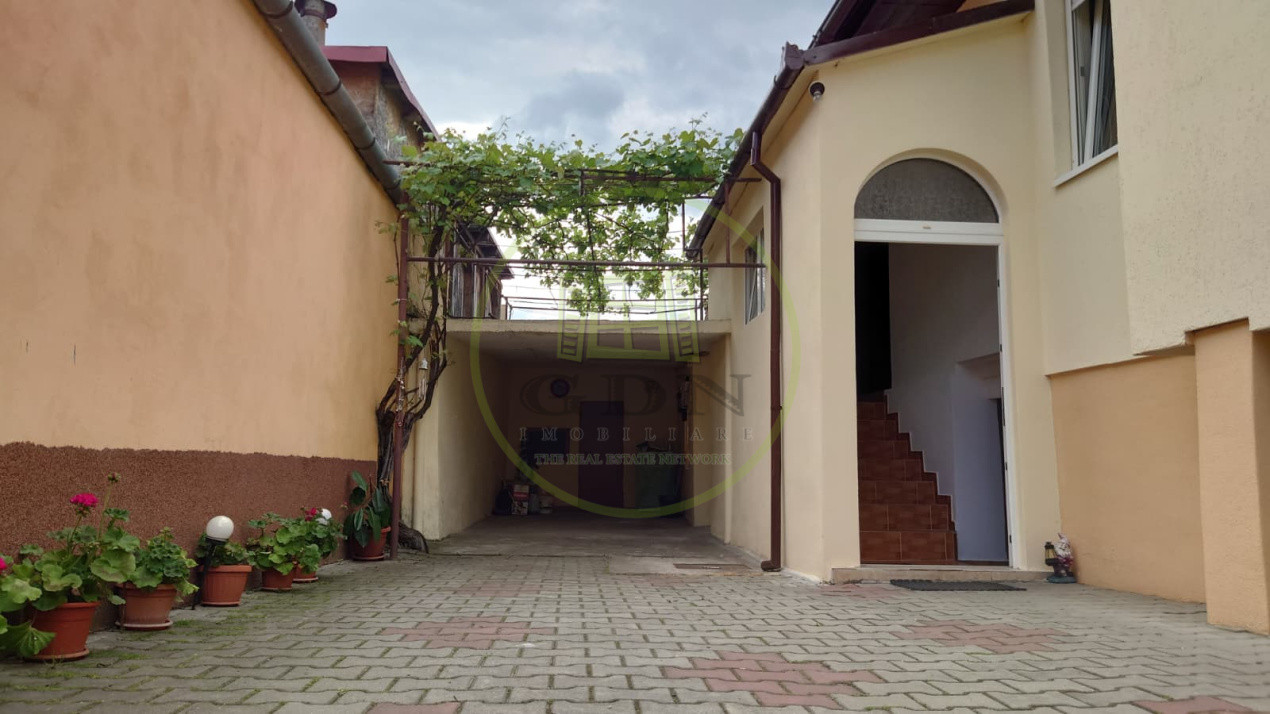 Casă individuală cu demisol + parter • 130 mp utili • Curte 237 mp • Garaj