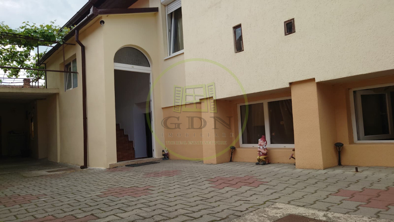 Casă individuală cu demisol + parter • 130 mp utili • Curte 237 mp • Garaj