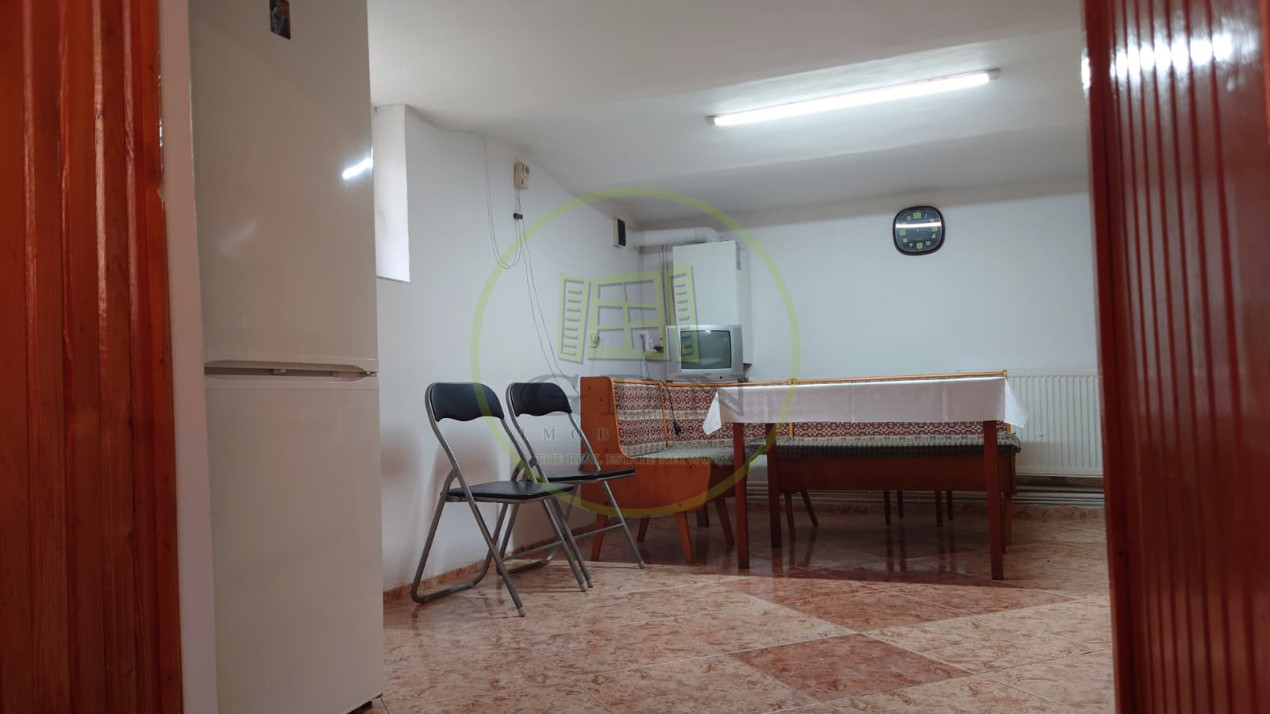 Casă individuală cu demisol + parter • 130 mp utili • Curte 237 mp • Garaj