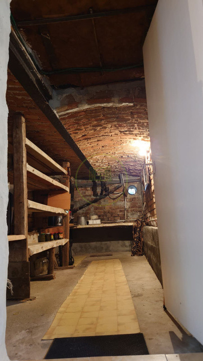 Casă individuală cu demisol + parter • 130 mp utili • Curte 237 mp • Garaj