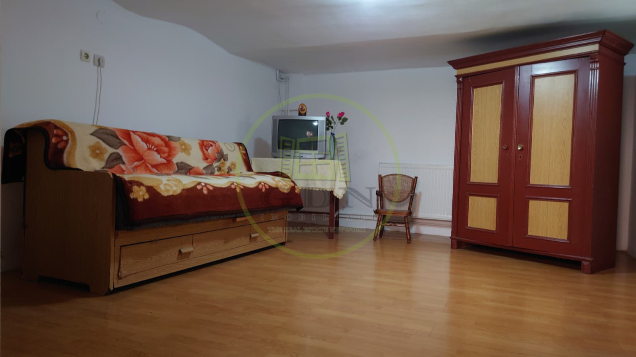 Casă individuală cu demisol + parter • 130 mp utili • Curte 237 mp • Garaj