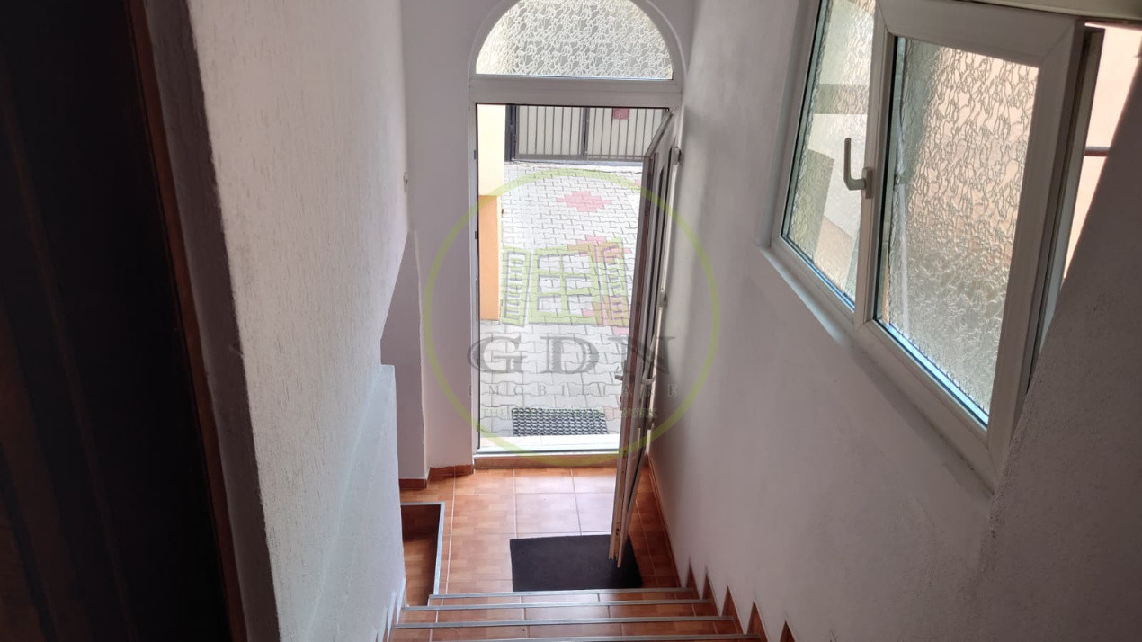 Casă individuală cu demisol + parter • 130 mp utili • Curte 237 mp • Garaj