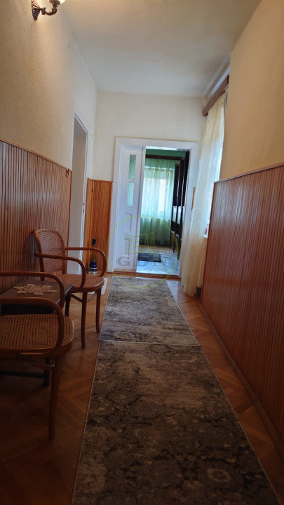 Casă individuală cu demisol + parter • 130 mp utili • Curte 237 mp • Garaj