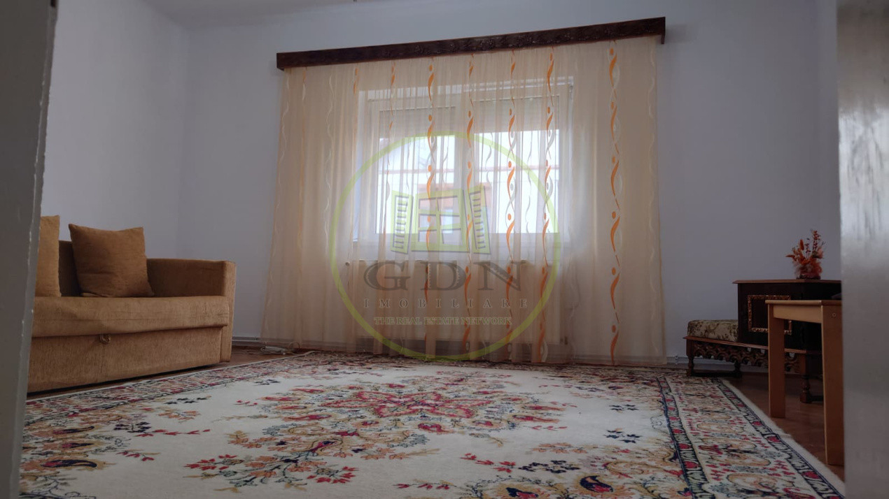 Casă individuală cu demisol + parter • 130 mp utili • Curte 237 mp • Garaj
