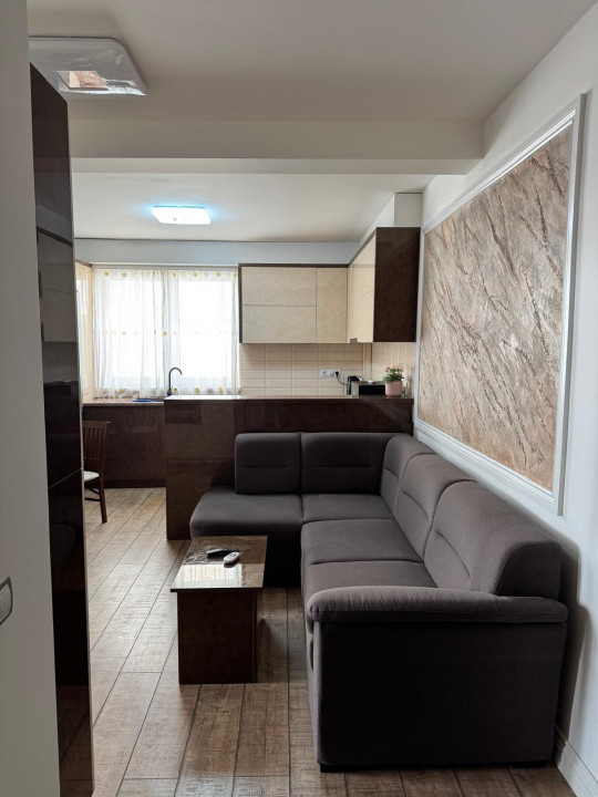 Apartamen 3 camere 50mp,mobilat si  cu o curte proprie  de inchiriat in Cisnadie